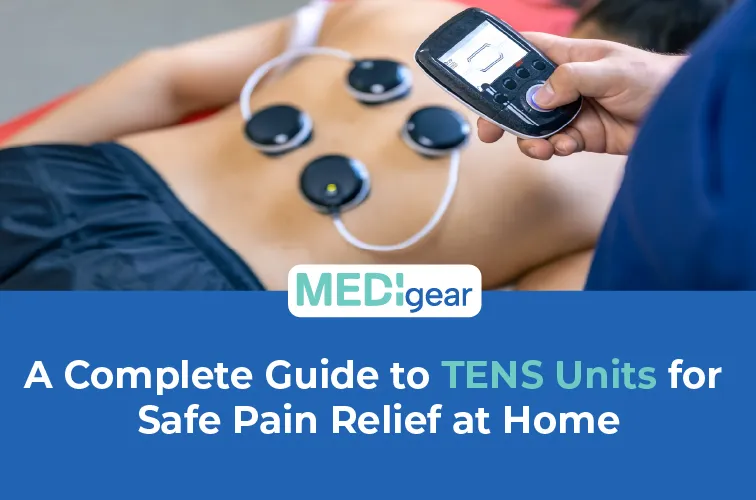 Portable TENS unit with electrode pads placed on adult lower back for pain relief