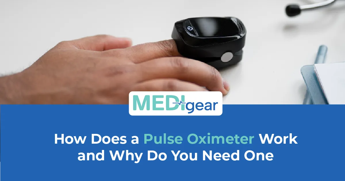 Fingertip pulse oximeter clipped to a patient's finger displaying SpO2 reading of 98 percent and hea