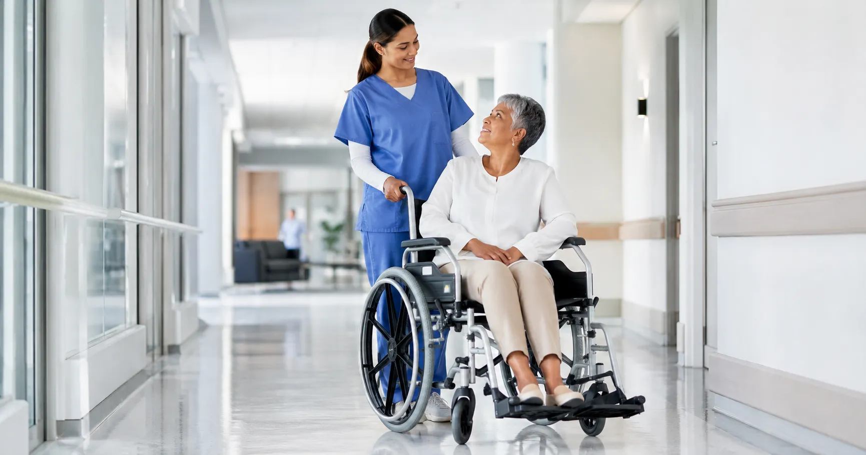 Hospital wheelchair used for safe and ergonomic patient mobility in wards, ICUs, and rehabilitation 
